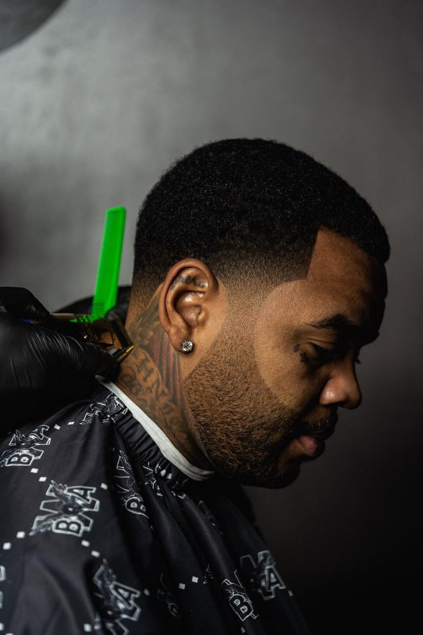 Low taper with a crisp beard line-up, cut by Ben Zweifel