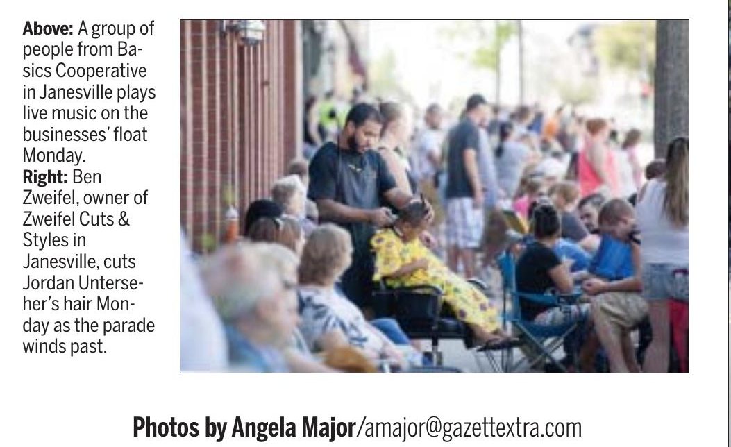 Gazette photo: Ben Zweifel cutting hair curbside during the Labor Day parade